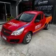 Chevrolet Montana vermelha com plotagem CenterFlex