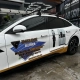 Lateral de BYD com adesivo Fase a Fase Elétrica e painel solar