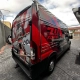 Van envelopada com tema do piloto Valentin Kordel em vermelho e preto