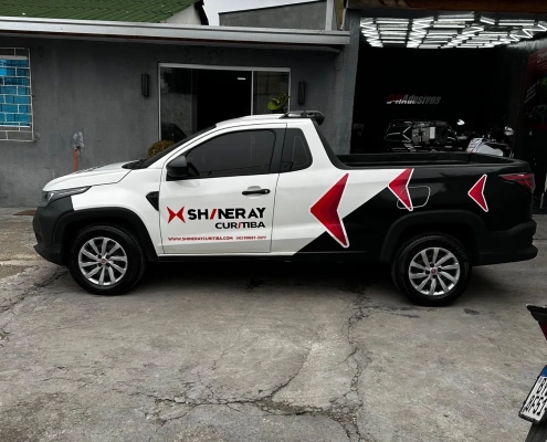 Chevrolet Agile com plotagem Flexx em cinza e laranja