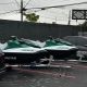 Dois jet skis verdes e brancos Ambiental Militar sobre carretas