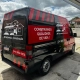 Van Fiat Ducato preta e vermelha plotada JM Reformas e Construção