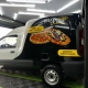 Furgão Fiat Fiorino preto e branco plotado DNA da Pizza
