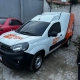 Fiat Fiorino branca da Adega Nova Fonte com envelopamento parcial laranja