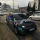 Saveiro 041 com grafismo colorido na rua, primeira loja 2020