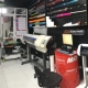 Área de produção da primeira loja 041 com plotter e recortadora