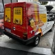 Fiat Fiorino Emporium com arte de pães e personagem padeira