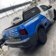 VW Saveiro Cross prata e azul plotada Cardan Atura
