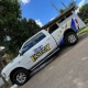 Picape Dodge branca com envelopamento parcial Circo Fantasy