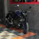 Honda Pop vermelha com plotagem lateral na loja 041