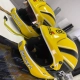 Capacete Stilo amarelo com patrocinador e logos em vinil